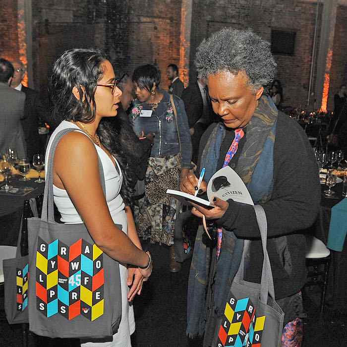 Claudia Rankine signing a copy of Citizen for a guest at the Graywolf Literary Gala